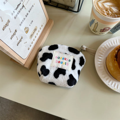 Cosbai Mini Plush Makeup Bag in pink, showing plush fabric detail