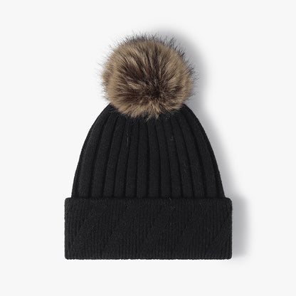 Black faux fur-lined pom-pom textured knit beanie product view