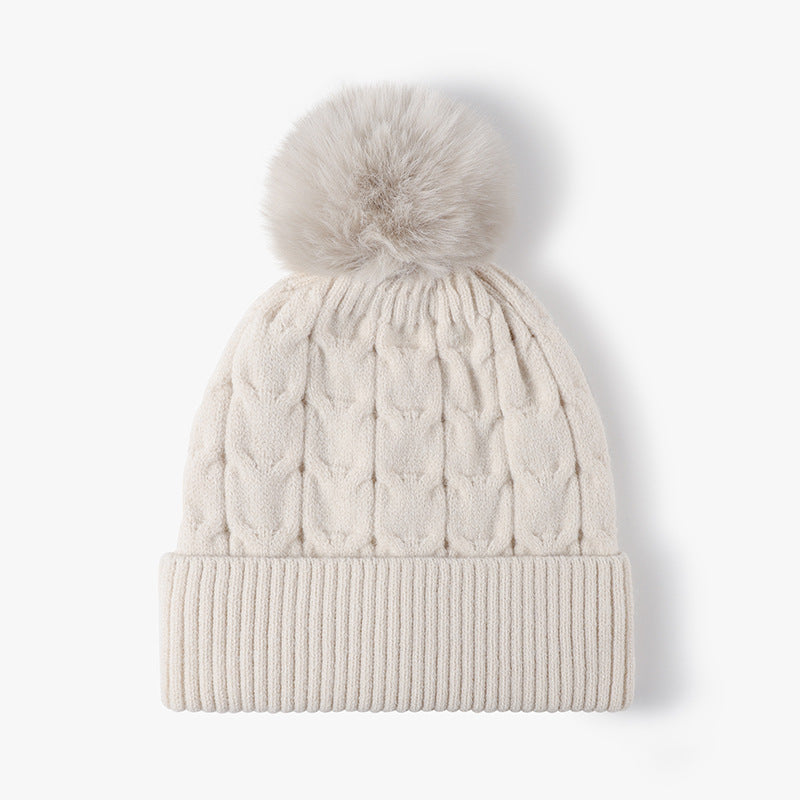 Beige plush lined cable knit pom beanie