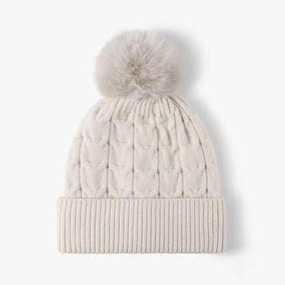 Beige plush lined cable knit pom beanie