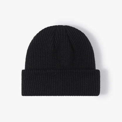 Black solid ribbed cuffed acrylic knit beanie product view
