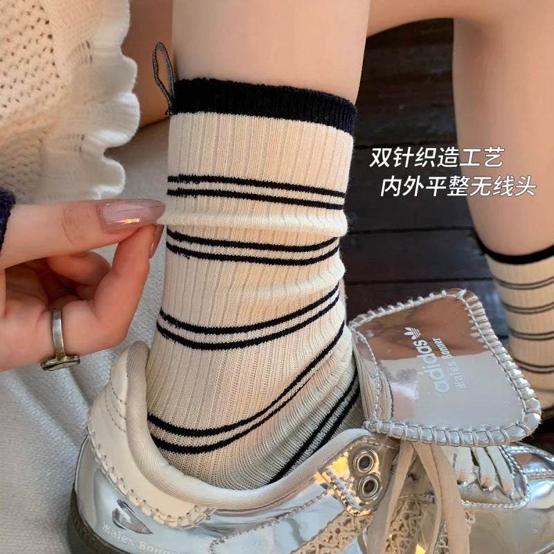奶白色条纹袜子女秋季纯棉布标中筒袜ins潮韩版学院风长袜堆堆袜