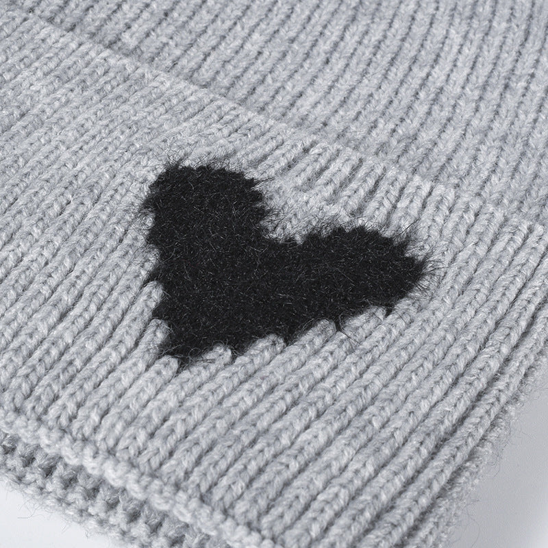 Pink heart accent cuffed knit beanie product view