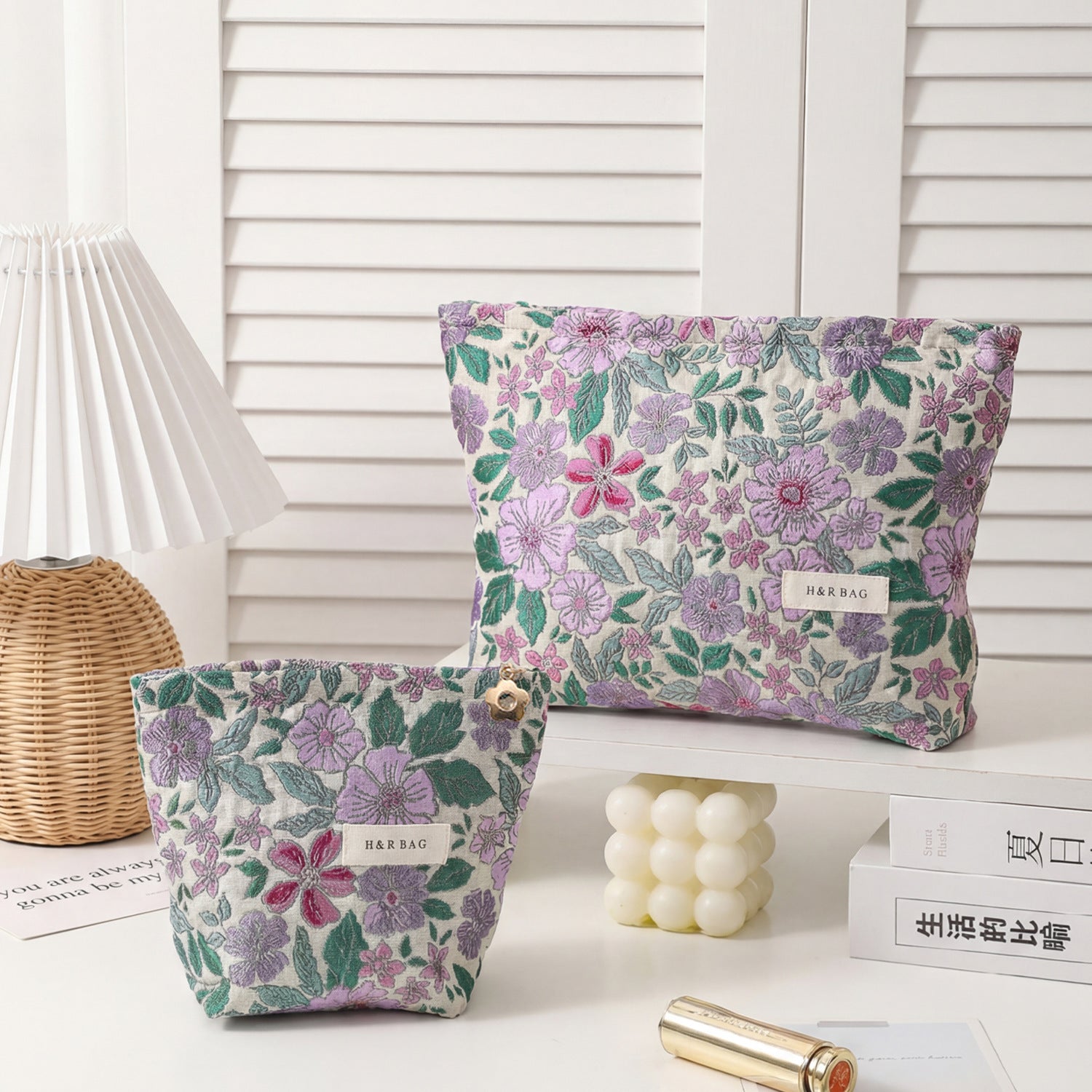 Cosbai textured flower cosmetic bag with chain strap in light color on white background