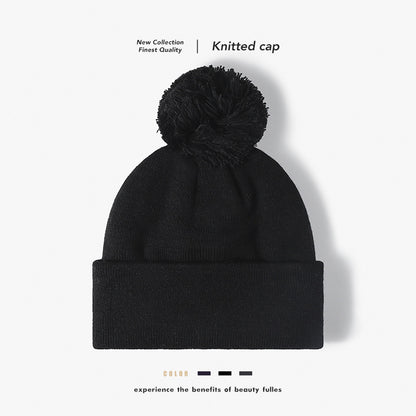 Black plush lined pom cuffed knit beanie overview