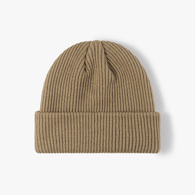 Beige solid ribbed cuffed acrylic knit beanie product view