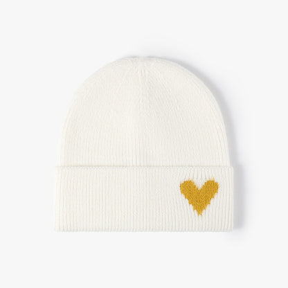 Ivory heart accent cuffed knit beanie product view