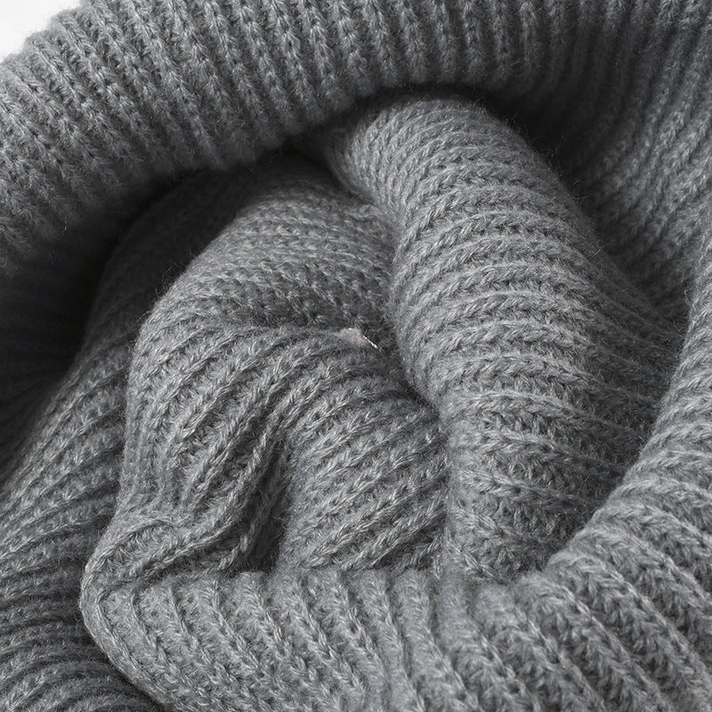 Black solid ribbed cuffed acrylic knit beanie product view
