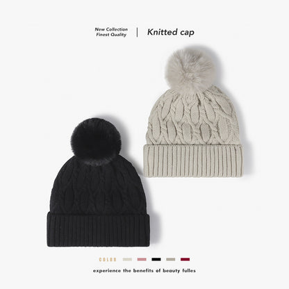 Burgundy cable knit pom-pom cuffed beanie product view
