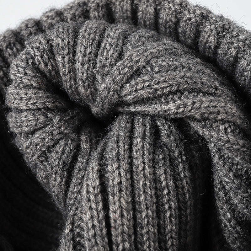 Gray label patch ribbed knit beanie crown detail