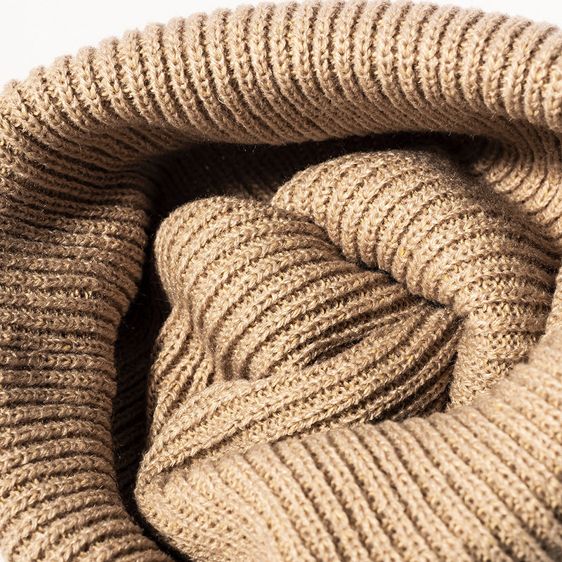 Beige essential ribbed knit beanie crown detail