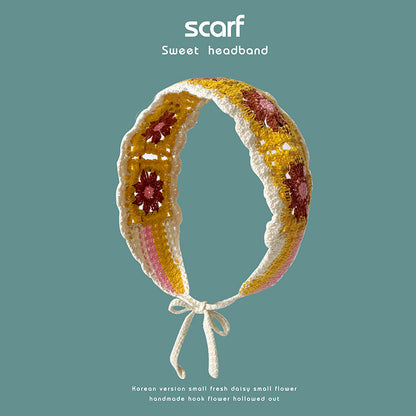 Scarvii Summer Crochet Daisy Hairband laid flat highlighting the daisy pattern