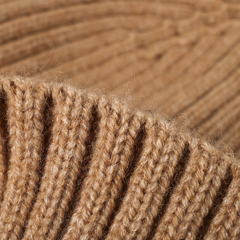 Black solid ribbed cuffed knit beanie product view
