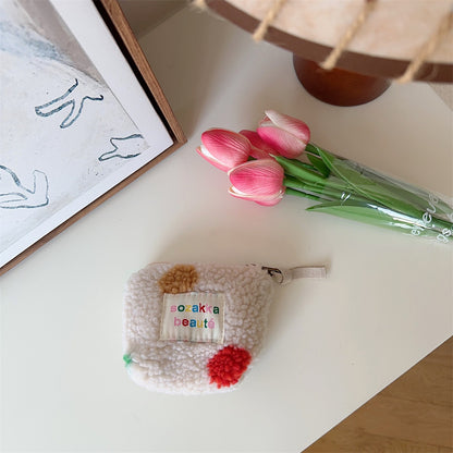 Cosbai Mini Plush Makeup Bag side view showing compact size and plush material