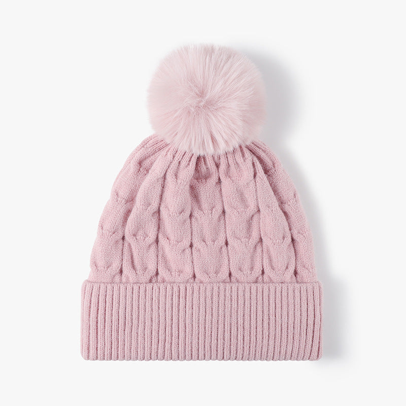 Pink plush lined cable knit pom beanie