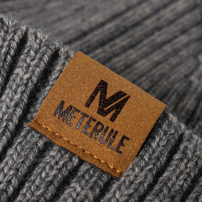 Gray label patch ribbed knit beanie patch detail