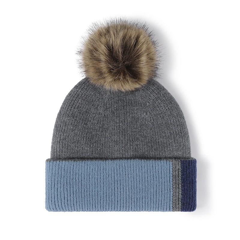 Gray colorblock plush lined pom knit beanie detail