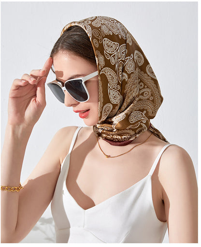 Scarvii Paisley scarf head wrap styled as a neck accessory