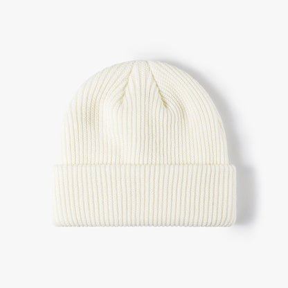 Ivory solid ribbed cuffed acrylic knit beanie product view