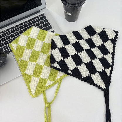Close-up of Scarvii crochet plaid hairband showing detailed stitching