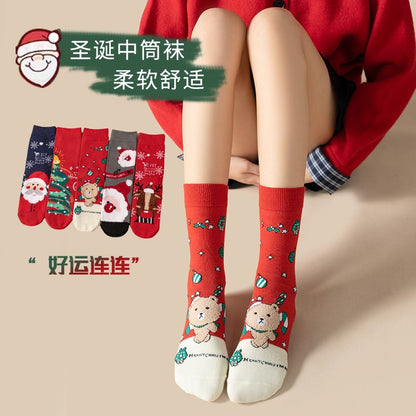 圣诞卡通麋鹿圣诞老人中筒女袜卡通大红直板长筒袜批发诸暨袜