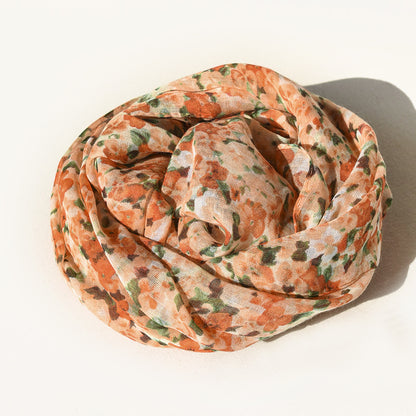 Scarvii Floral Summer Long Scarf shown with floral pattern in natural light