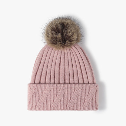 Pink faux fur-lined pom-pom textured knit beanie product view