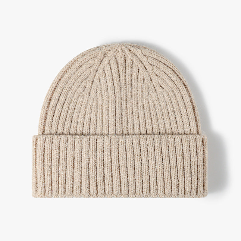 Beige solid ribbed cuffed knit beanie product view