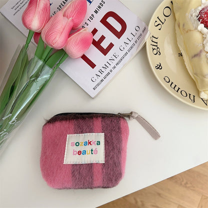 Cosbai Mini Plush Makeup Bag showing soft plush fabric and compact design
