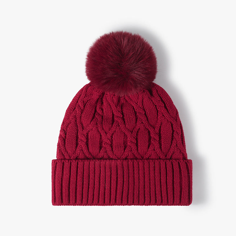 Burgundy cable knit pom-pom cuffed beanie product view