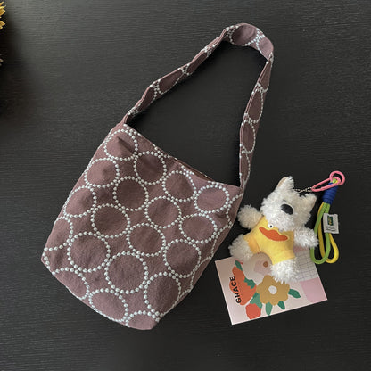 Top view of Cosbai slouch tote bag showing open interior and lining