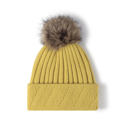 White faux fur-lined pom-pom textured knit beanie product view