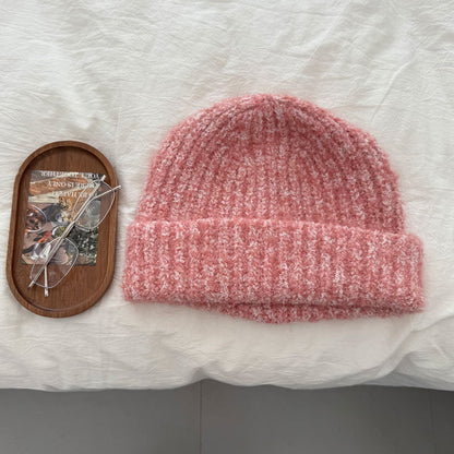 Pink textured fleck knit beanie flat lay