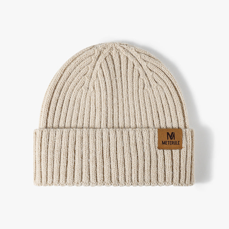 Ivory label patch ribbed knit beanie