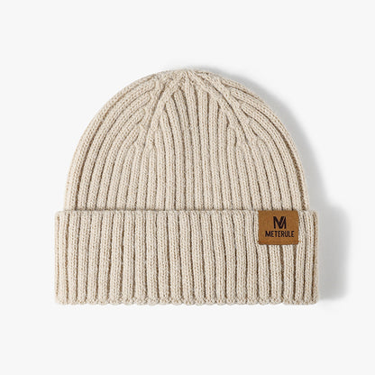 Ivory label patch ribbed knit beanie