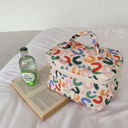 Cosbai floral large cosmetic bag lying flat showing full floral design