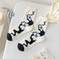Rufia - Black and White Floral Patterned Socks
