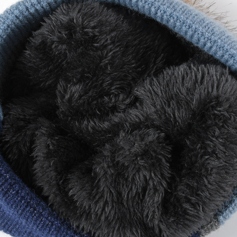 Gray colorblock plush lined pom knit beanie detail