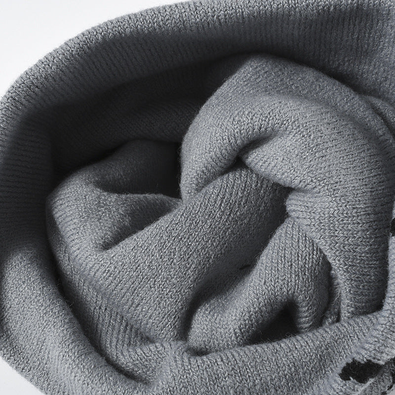 Black spiderweb graphic brimless knit beanie product view