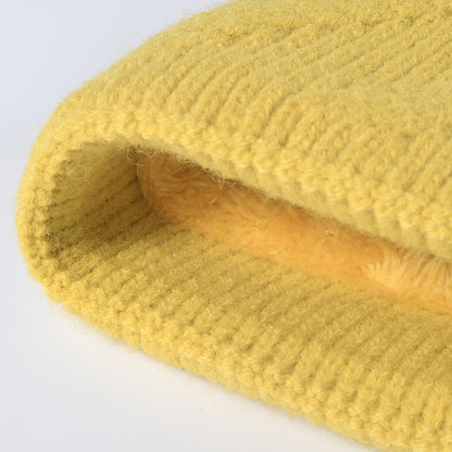 White faux fur-lined pom-pom textured knit beanie product view