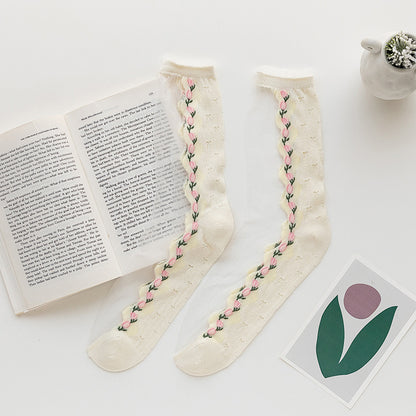 Rufia crew socks with mesh tulip pattern laid out to show full length and design