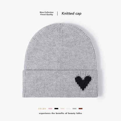Pink heart accent cuffed knit beanie product view