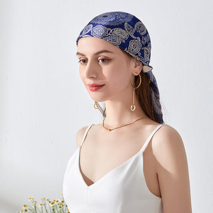 Scarvii Paisley scarf head wrap displayed flat with paisley design