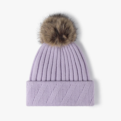 Purple faux fur-lined pom-pom textured knit beanie product view