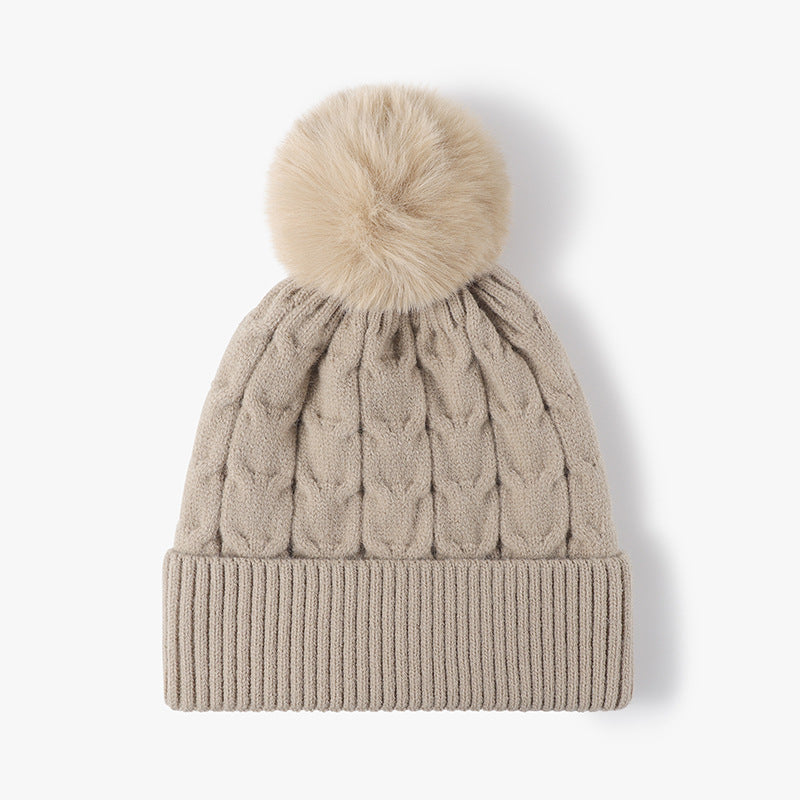 Brown plush lined cable knit pom beanie