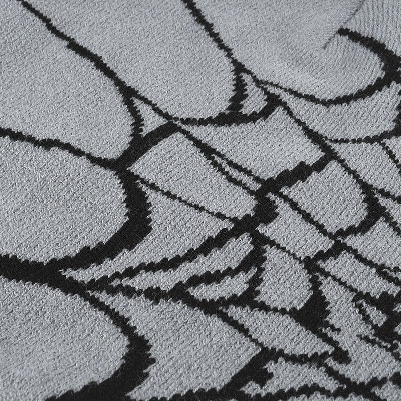 Black spiderweb graphic brimless knit beanie product view