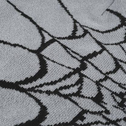 Black spiderweb graphic brimless knit beanie product view