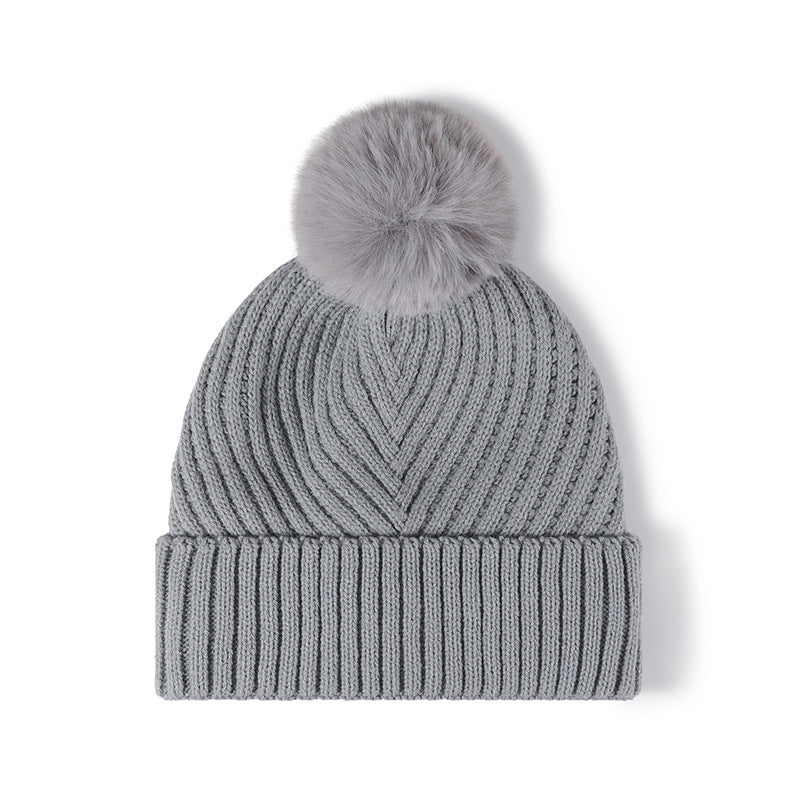 White pom-pom faux fur-lined cuffed knit beanie product view