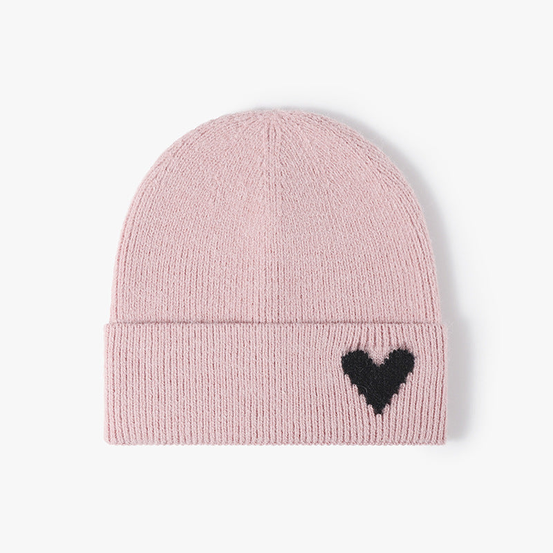 Pink heart accent cuffed knit beanie product view