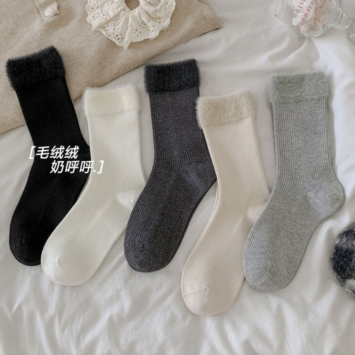 毛绒罗口袜子女士秋冬季加厚保暖中筒袜百搭纯色无骨双针棉袜批发